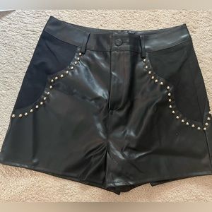 Faux leather studded shorts. Black shorts with gold details. NWT. Size large.
